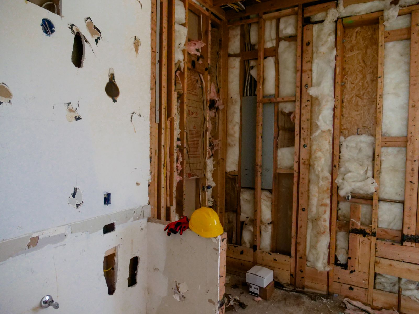 A room stripped back to the studs during a tear-out